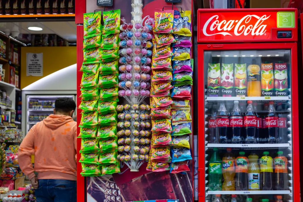 Besiktas, Turkey - May 7 2020: Packaged FMCG (Fast moving consumer goods) products displayed on a street shelf of traditional market in Besiktas.