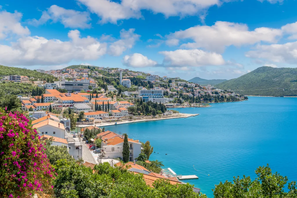 Charming coastal town of Neum in Bosnia and Herzegovina with its scenic views, red rooftops, and blue waters