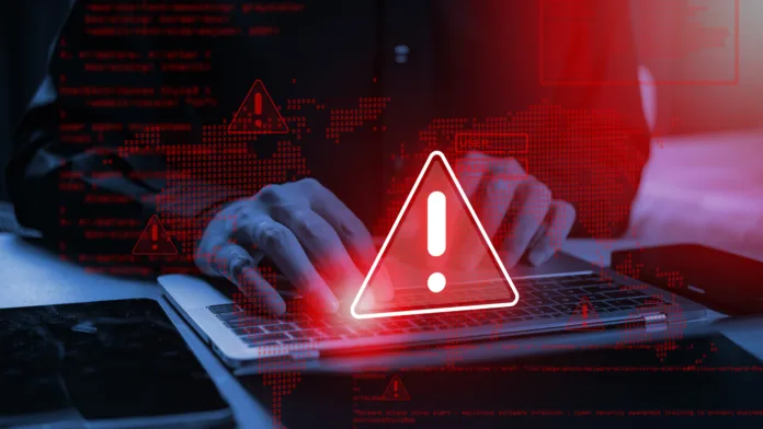 system-warning-hacked-alert-cyberattack-on-computer-network-cybersecurity-vulnerability-data-breach-illegal-connection-compromised-information-malicious-software-virus-and-cybercrime-stockpack-istock System warning: hacked alert! Cyberattack on computer network. Cybersecurity vulnerability, data breach, illegal connection, compromised information. Malicious software, virus, and cybercrime.