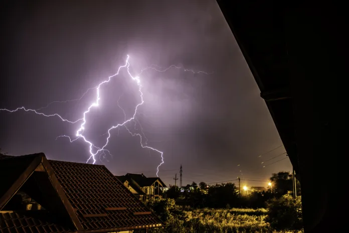 lightning-storm-over-a-residential-area-stockpack-istock Lightning storm over a residential area