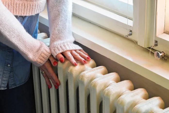 old-heavy-duty-radiator-heats-the-room-in-best-way-stockpack-istock Old heavy duty radiator heats the room in best way