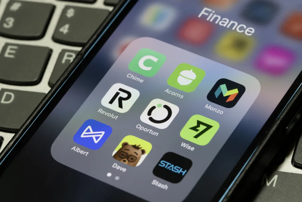 Portland, OR, USA - Sep 4, 2025: Assorted apps by neobanks or banking fintech firms, including Chime, Acorns, Monzo, Revolut, Oportun, Wise, Albert, Dave, and Stash, are seen on the screen of an iPhone.