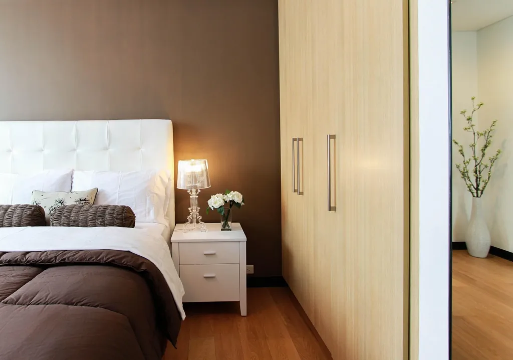 bed, bedroom, closet, furniture, lamp, light, betstand, bed table, brown light, brown table, brown bed, brown bedroom, brown lamp, brown lights, bed, bed, bedroom, bedroom, bedroom, bedroom, bedroom