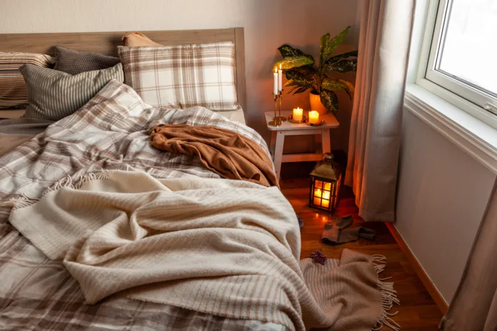 cozy-scandinavian-bedroom-interior-in-natural-tones-real-life-mess-disorder-stockpack-istock cozy scandinavian bedroom interior in natural tones, real life mess disorder