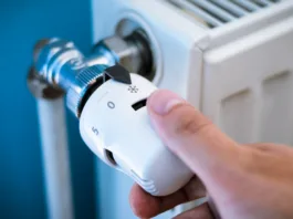 One hand adjust thermostat valve close up